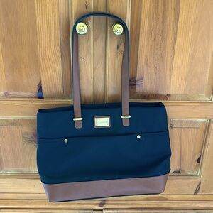 Calvin Klein two toned, very classy purse.